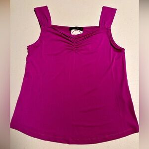 Never worn tank top. Still has tags. Size medium